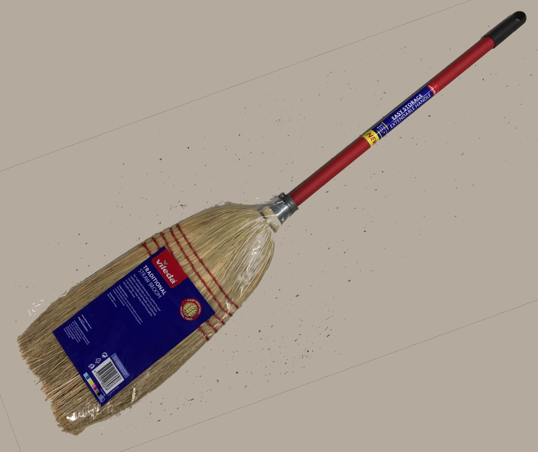 Straw broom with red
handle