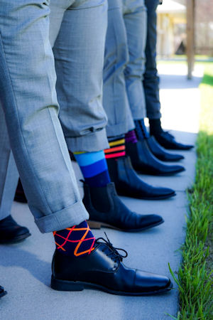 Feet and socks of groom
                      and other males